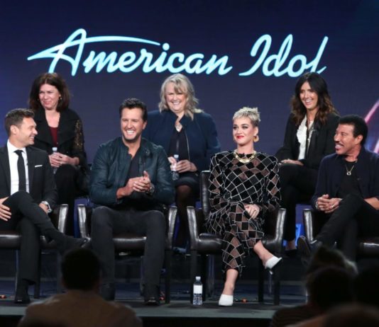 Jennifer Mullin, Trish Kinane, Megan Michaels Wolflick, Ryan Seacrest, Luke Bryan, Katy Perry, and Lionel Richie at an ABC "American Idol" panel in 2018.