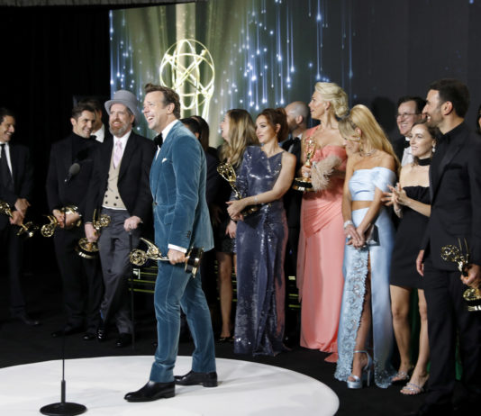 Jason Sudeikis and the cast and crew of "Ted Lasso" with their award for Outstanding Comedy Series at the 73rd Annual Emmy Awards.