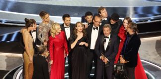 The cast and producers of "CODA" accept the award for Best Picture at the 94th Academy Awards