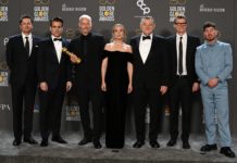 Peter Czernin, Colin Farrell, Martin McDonagh, Kerry Condon, Brendan Gleeson, Graham Broadbent, and Barry Keoghan with the award for Best Film, Musical or Comedy: "The Banshees of Inisherin" at the 80th Annual Golden Globe Awards