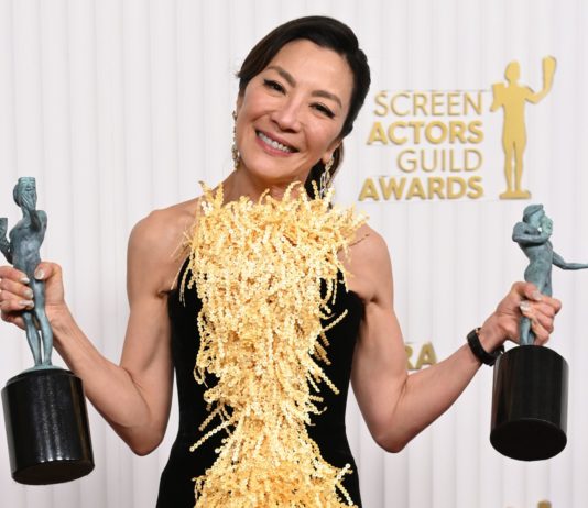 Michelle Yeoh of "Everything Everywhere All at Once" with her awards at the 29th Annual Screen Actors Guild Awards in February 2023